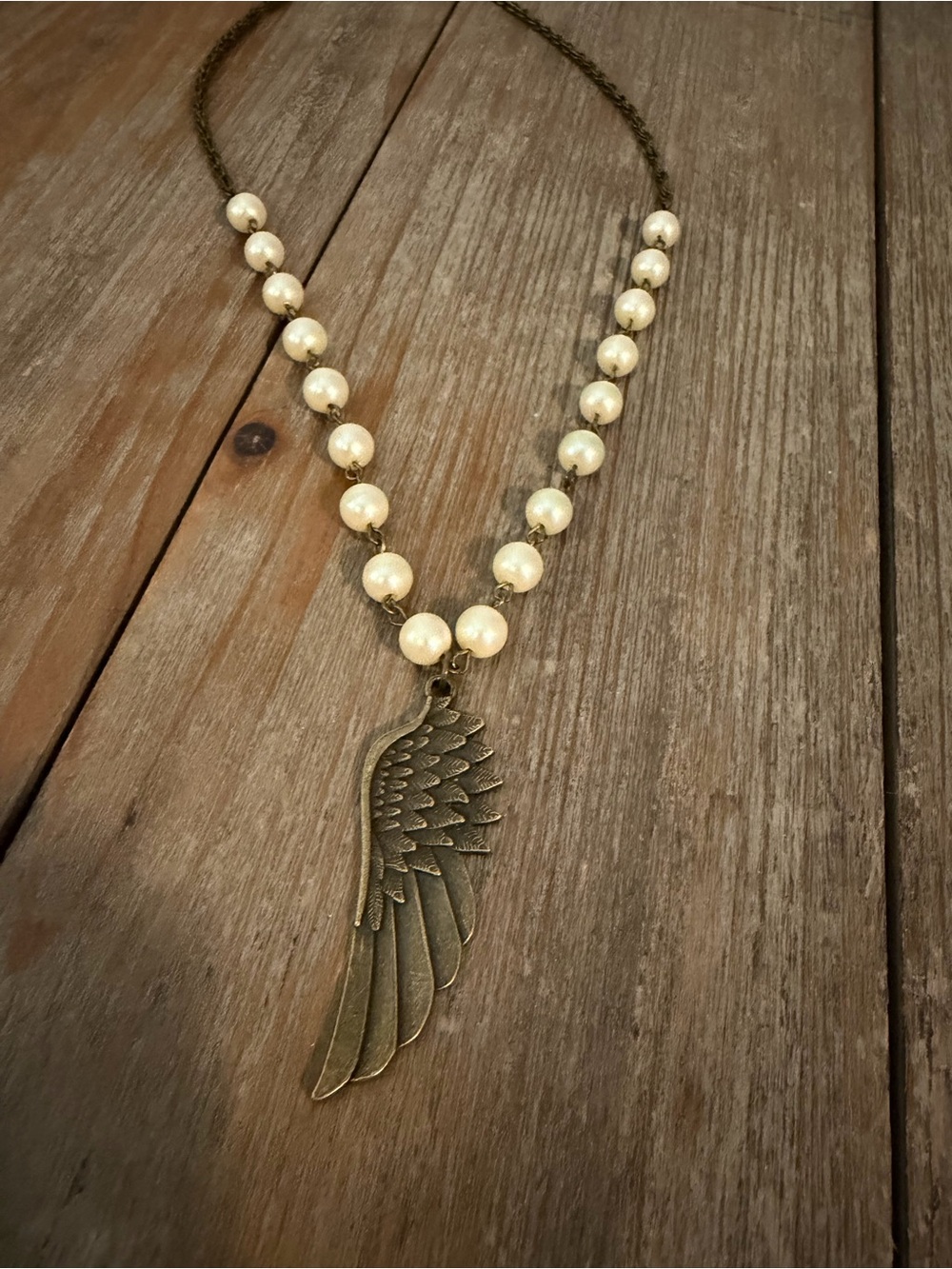 Pearl Bead Necklace with Antique Gold Wing Pendant